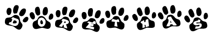 The image shows a series of animal paw prints arranged in a horizontal line. Each paw print contains a letter, and together they spell out the word Dorethas.