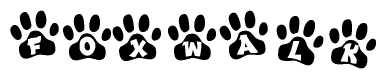 The image shows a row of animal paw prints, each containing a letter. The letters spell out the word Foxwalk within the paw prints.