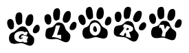 The image shows a series of animal paw prints arranged in a horizontal line. Each paw print contains a letter, and together they spell out the word Glory.