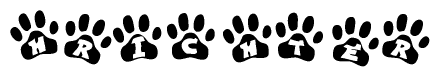 The image shows a row of animal paw prints, each containing a letter. The letters spell out the word Hrichter within the paw prints.
