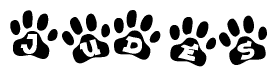 The image shows a series of animal paw prints arranged horizontally. Within each paw print, there's a letter; together they spell Judes