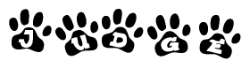 The image shows a series of animal paw prints arranged in a horizontal line. Each paw print contains a letter, and together they spell out the word Judge.