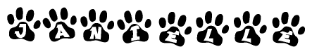 The image shows a series of animal paw prints arranged in a horizontal line. Each paw print contains a letter, and together they spell out the word Janielle.