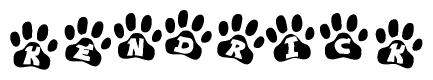 The image shows a series of animal paw prints arranged in a horizontal line. Each paw print contains a letter, and together they spell out the word Kendrick.