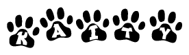 The image shows a row of animal paw prints, each containing a letter. The letters spell out the word Kaity within the paw prints.