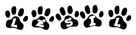 The image shows a row of animal paw prints, each containing a letter. The letters spell out the word Lesil within the paw prints.
