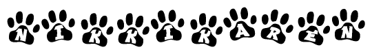 The image shows a series of animal paw prints arranged in a horizontal line. Each paw print contains a letter, and together they spell out the word Nikkikaren.