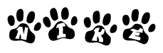 The image shows a series of animal paw prints arranged horizontally. Within each paw print, there's a letter; together they spell Nike