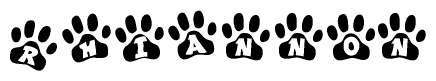 The image shows a row of animal paw prints, each containing a letter. The letters spell out the word Rhiannon within the paw prints.