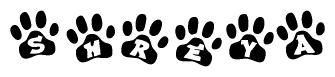 The image shows a row of animal paw prints, each containing a letter. The letters spell out the word Shreya within the paw prints.