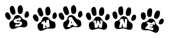 The image shows a row of animal paw prints, each containing a letter. The letters spell out the word Shawne within the paw prints.