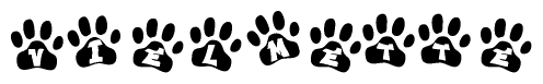 The image shows a series of animal paw prints arranged horizontally. Within each paw print, there's a letter; together they spell Vielmette