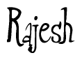 The image is a stylized text or script that reads 'Rajesh' in a cursive or calligraphic font.