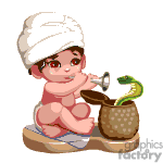 Small boy performing as a snake charmer