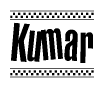 The image contains the text Kumar in a bold, stylized font, with a checkered flag pattern bordering the top and bottom of the text.