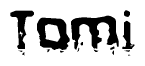 This nametag says Tomi, and has a static looking effect at the bottom of the words. The words are in a stylized font.