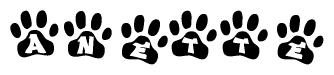 The image shows a series of animal paw prints arranged horizontally. Within each paw print, there's a letter; together they spell Anette