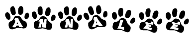 The image shows a row of animal paw prints, each containing a letter. The letters spell out the word Annalee within the paw prints.