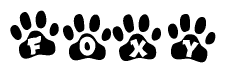 The image shows a series of animal paw prints arranged in a horizontal line. Each paw print contains a letter, and together they spell out the word Foxy.