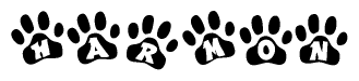 The image shows a series of animal paw prints arranged horizontally. Within each paw print, there's a letter; together they spell Harmon