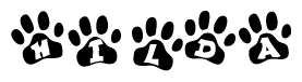 The image shows a series of animal paw prints arranged horizontally. Within each paw print, there's a letter; together they spell Hilda