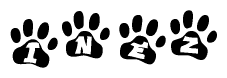 The image shows a series of animal paw prints arranged in a horizontal line. Each paw print contains a letter, and together they spell out the word Inez.