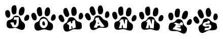 The image shows a row of animal paw prints, each containing a letter. The letters spell out the word Johannes within the paw prints.
