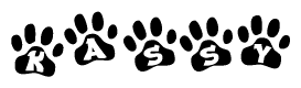 The image shows a series of animal paw prints arranged in a horizontal line. Each paw print contains a letter, and together they spell out the word Kassy.