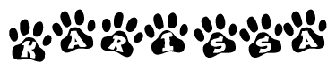 The image shows a series of animal paw prints arranged horizontally. Within each paw print, there's a letter; together they spell Karissa