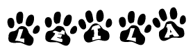 The image shows a row of animal paw prints, each containing a letter. The letters spell out the word Leila within the paw prints.