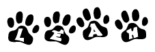 The image shows a row of animal paw prints, each containing a letter. The letters spell out the word Leah within the paw prints.