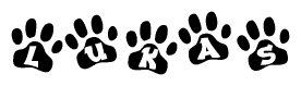 The image shows a series of animal paw prints arranged in a horizontal line. Each paw print contains a letter, and together they spell out the word Lukas.