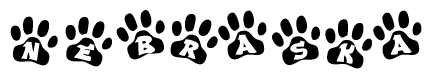 The image shows a series of animal paw prints arranged horizontally. Within each paw print, there's a letter; together they spell Nebraska