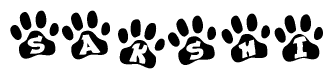 The image shows a series of animal paw prints arranged in a horizontal line. Each paw print contains a letter, and together they spell out the word Sakshi.