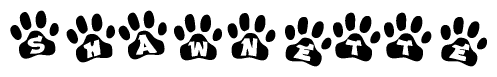 The image shows a series of animal paw prints arranged in a horizontal line. Each paw print contains a letter, and together they spell out the word Shawnette.