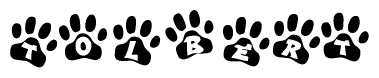 The image shows a series of animal paw prints arranged in a horizontal line. Each paw print contains a letter, and together they spell out the word Tolbert.