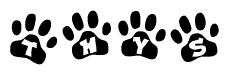 The image shows a series of animal paw prints arranged horizontally. Within each paw print, there's a letter; together they spell Thys