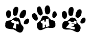 The image shows a row of animal paw prints, each containing a letter. The letters spell out the word The within the paw prints.