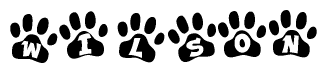 The image shows a series of animal paw prints arranged horizontally. Within each paw print, there's a letter; together they spell Wilson