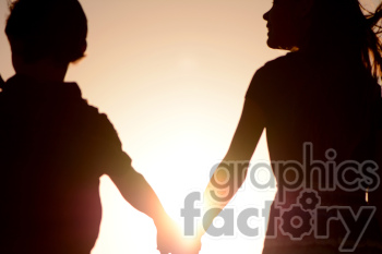 silhouette of friends sunset photo. Royalty-free photo # 391273