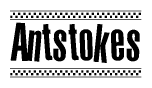 The image contains the text Antstokes in a bold, stylized font, with a checkered flag pattern bordering the top and bottom of the text.