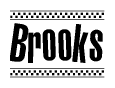 The clipart image displays the text Brooks in a bold, stylized font. It is enclosed in a rectangular border with a checkerboard pattern running below and above the text, similar to a finish line in racing. 