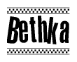 The image is a black and white clipart of the text Bethka in a bold, italicized font. The text is bordered by a dotted line on the top and bottom, and there are checkered flags positioned at both ends of the text, usually associated with racing or finishing lines.