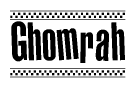 The image contains the text Ghomrah in a bold, stylized font, with a checkered flag pattern bordering the top and bottom of the text.
