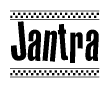 The image contains the text Jantra in a bold, stylized font, with a checkered flag pattern bordering the top and bottom of the text.