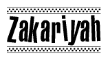 The image is a black and white clipart of the text Zakariyah in a bold, italicized font. The text is bordered by a dotted line on the top and bottom, and there are checkered flags positioned at both ends of the text, usually associated with racing or finishing lines.