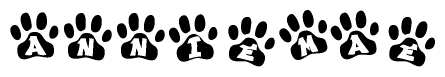 The image shows a row of animal paw prints, each containing a letter. The letters spell out the word Anniemae within the paw prints.