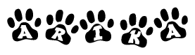 The image shows a series of animal paw prints arranged in a horizontal line. Each paw print contains a letter, and together they spell out the word Arika.
