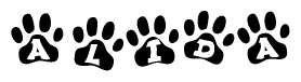 The image shows a series of animal paw prints arranged in a horizontal line. Each paw print contains a letter, and together they spell out the word Alida.