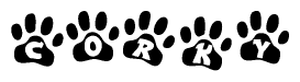 The image shows a series of animal paw prints arranged in a horizontal line. Each paw print contains a letter, and together they spell out the word Corky.
